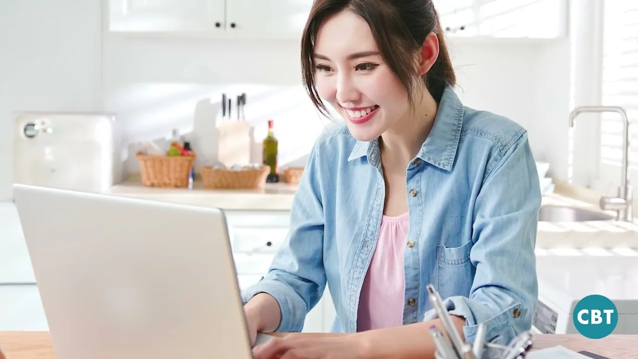 Excited Woman At Laptop Article Hero Background