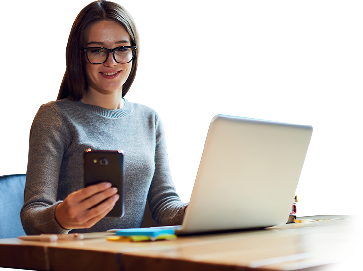 ad-tech-firms-improved-consumer-experience-new-graphic Business Woman at Desk Using Phone